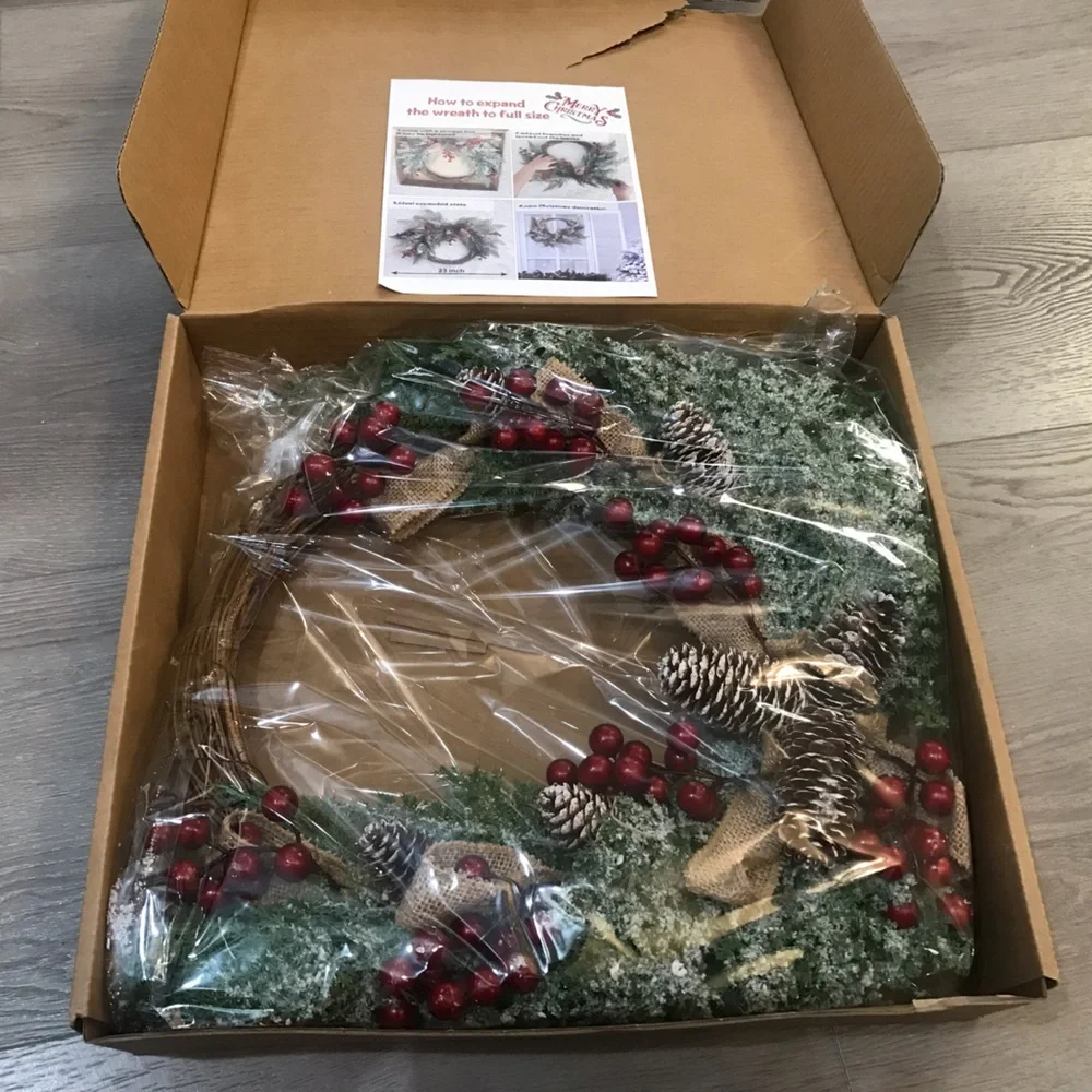 Festive Holiday Wreath with Red Berries, Pinecones and Artificial Snow